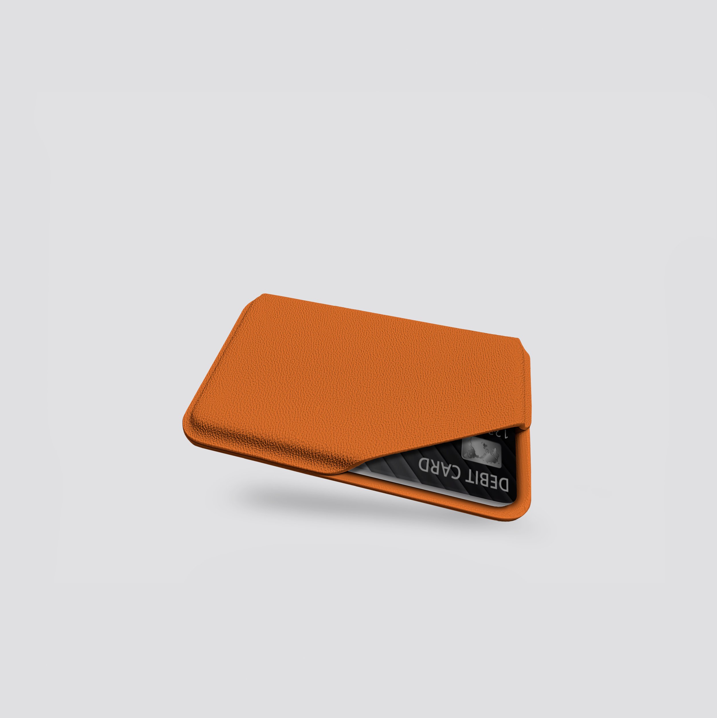 Orange cardholder with a reflective surface on a light gray background