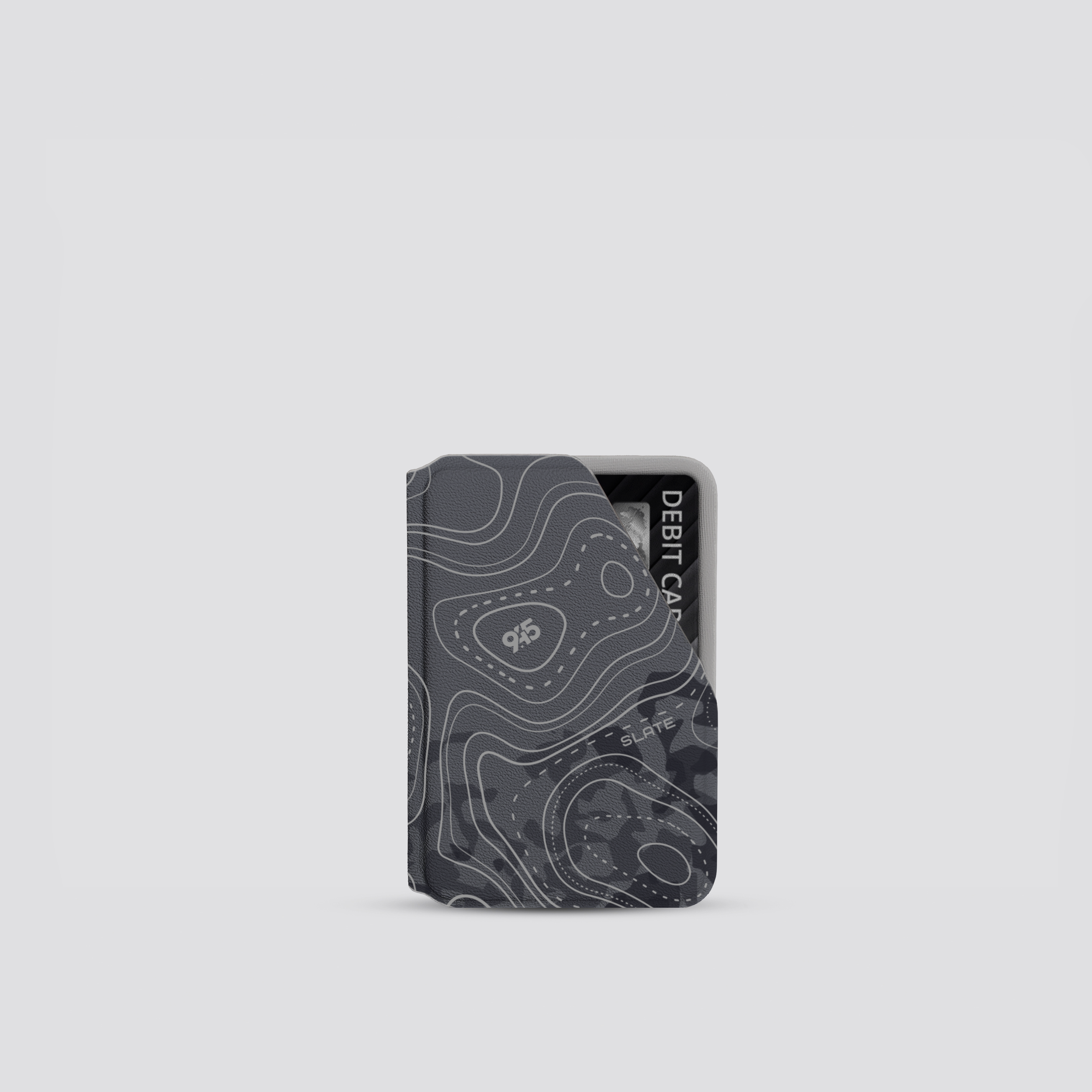Cardholder with topographic design on a light gray background