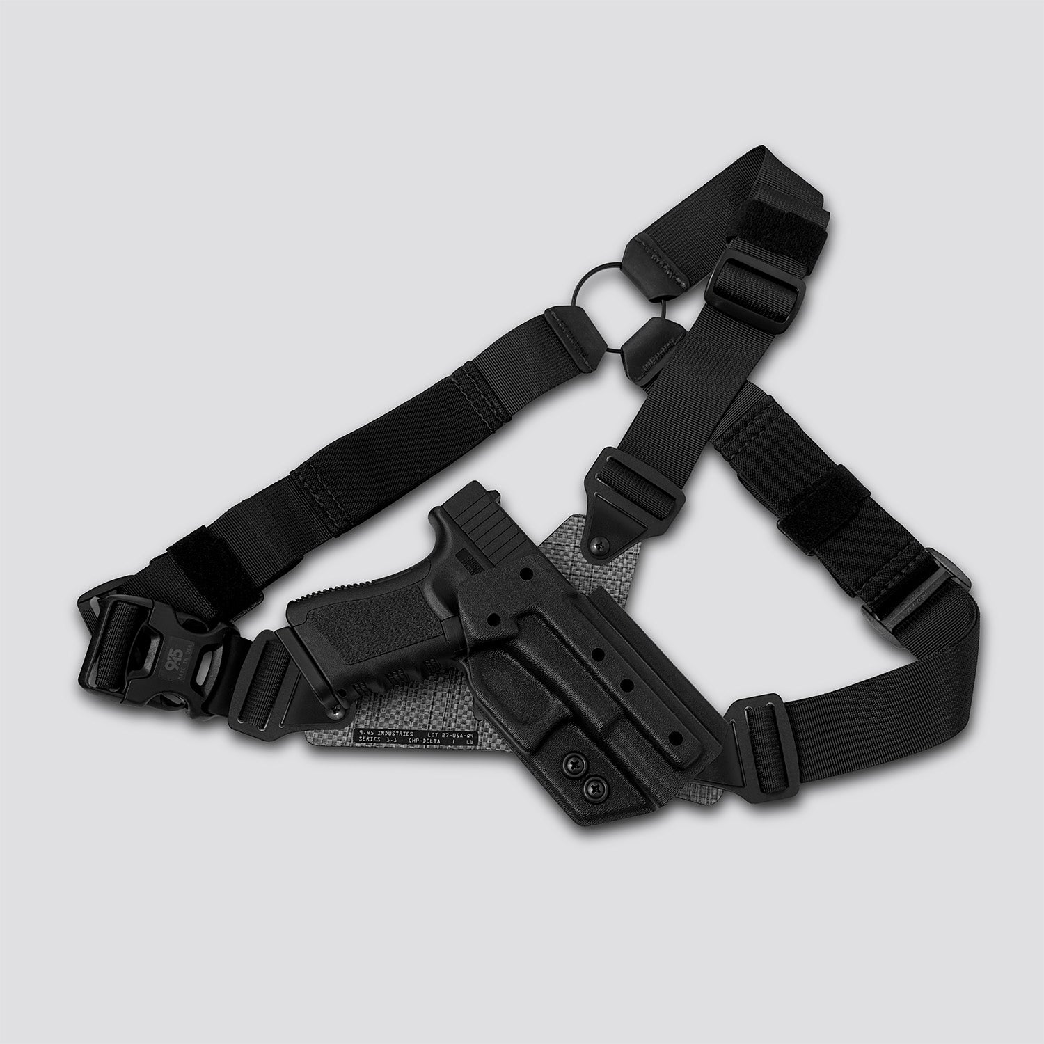 Black tactical holster with belt on a light gray background