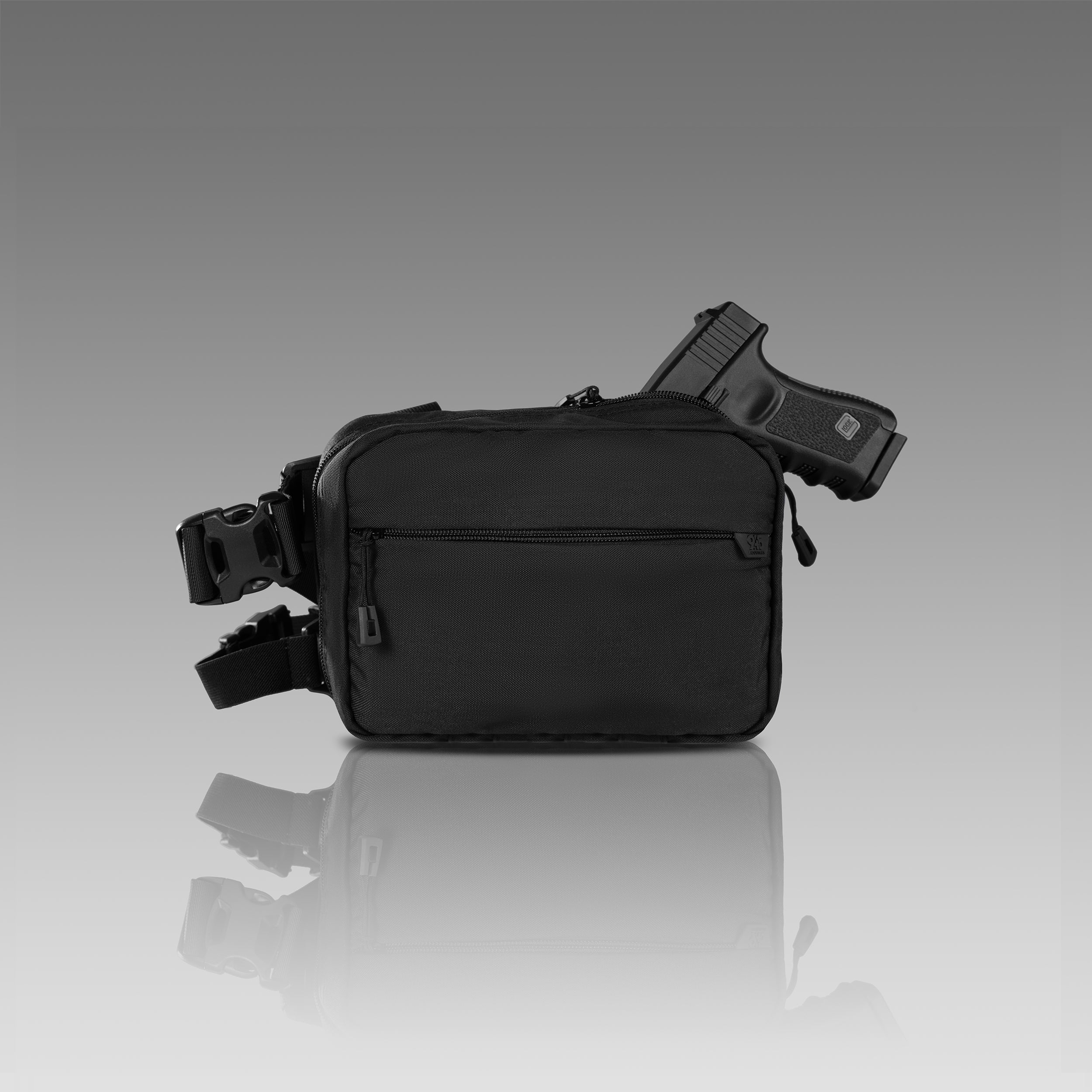 Black waist bag with a gun on a gray background
