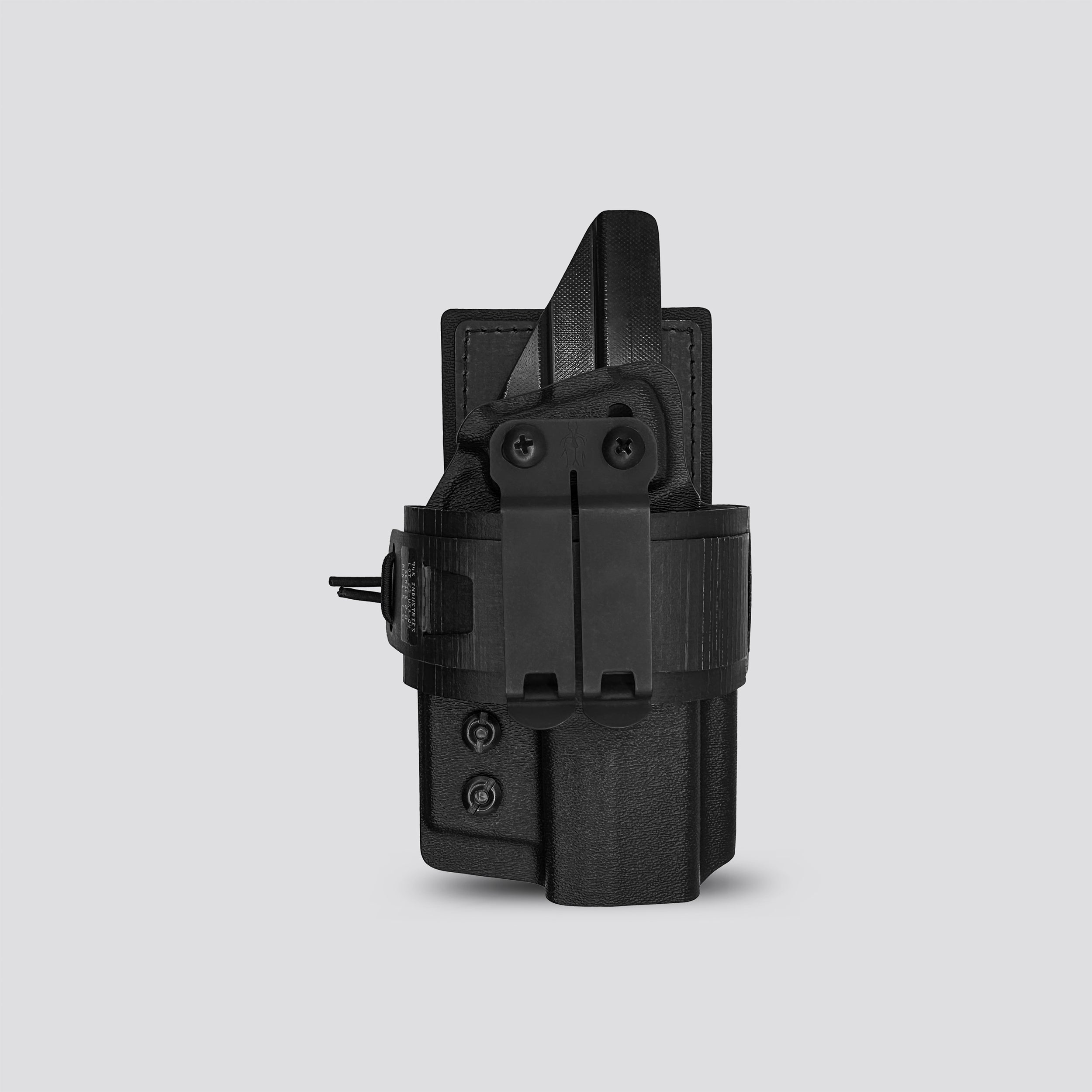 Black IWB Tegris holster adapter with black panel and belt with IWB holster on a light gray background