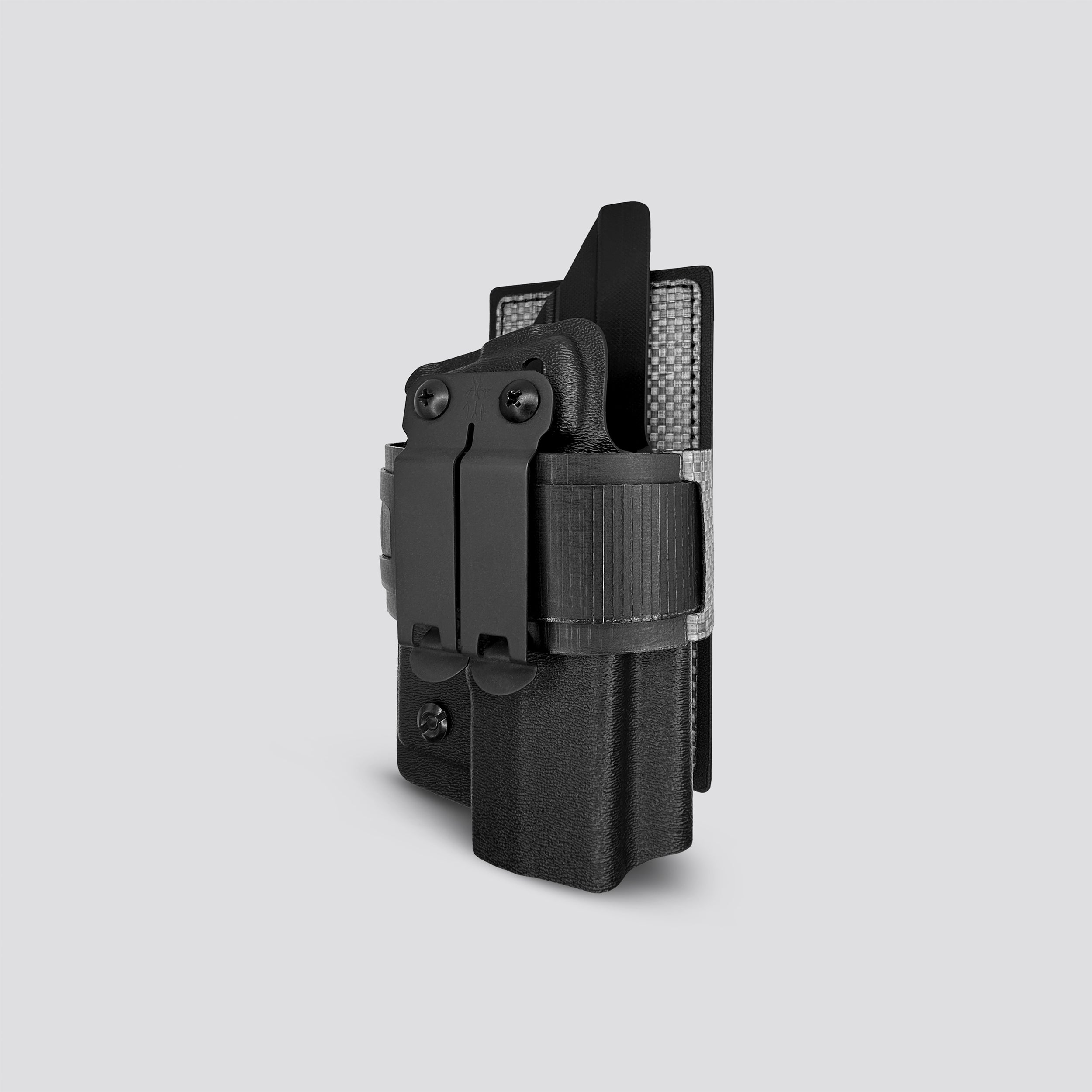 Black on titanium IWB tegris holster adapter with titanium panel and black belt with IWB holster on a light gray background