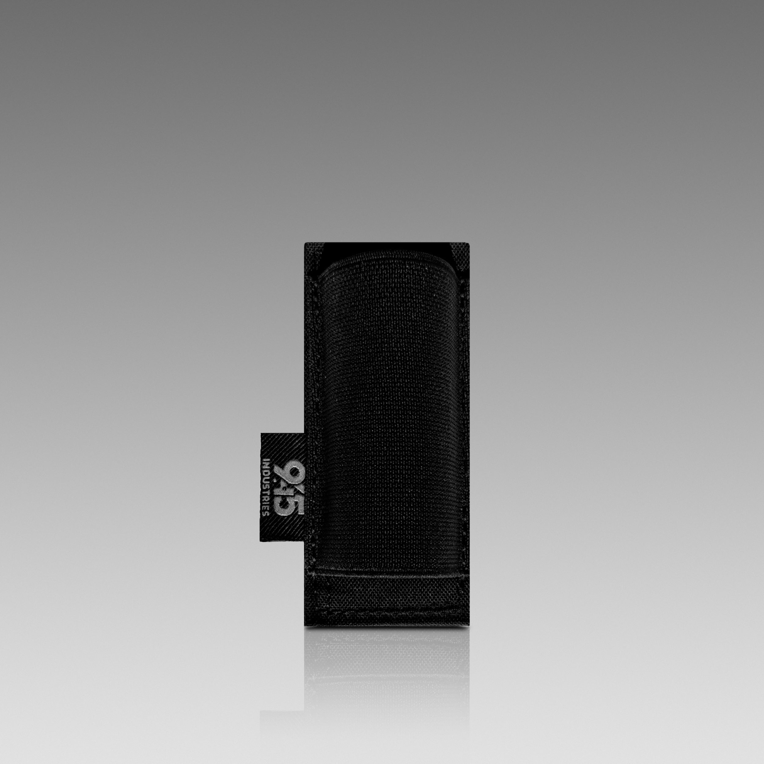 Black pouch with a brand tag on a gray background