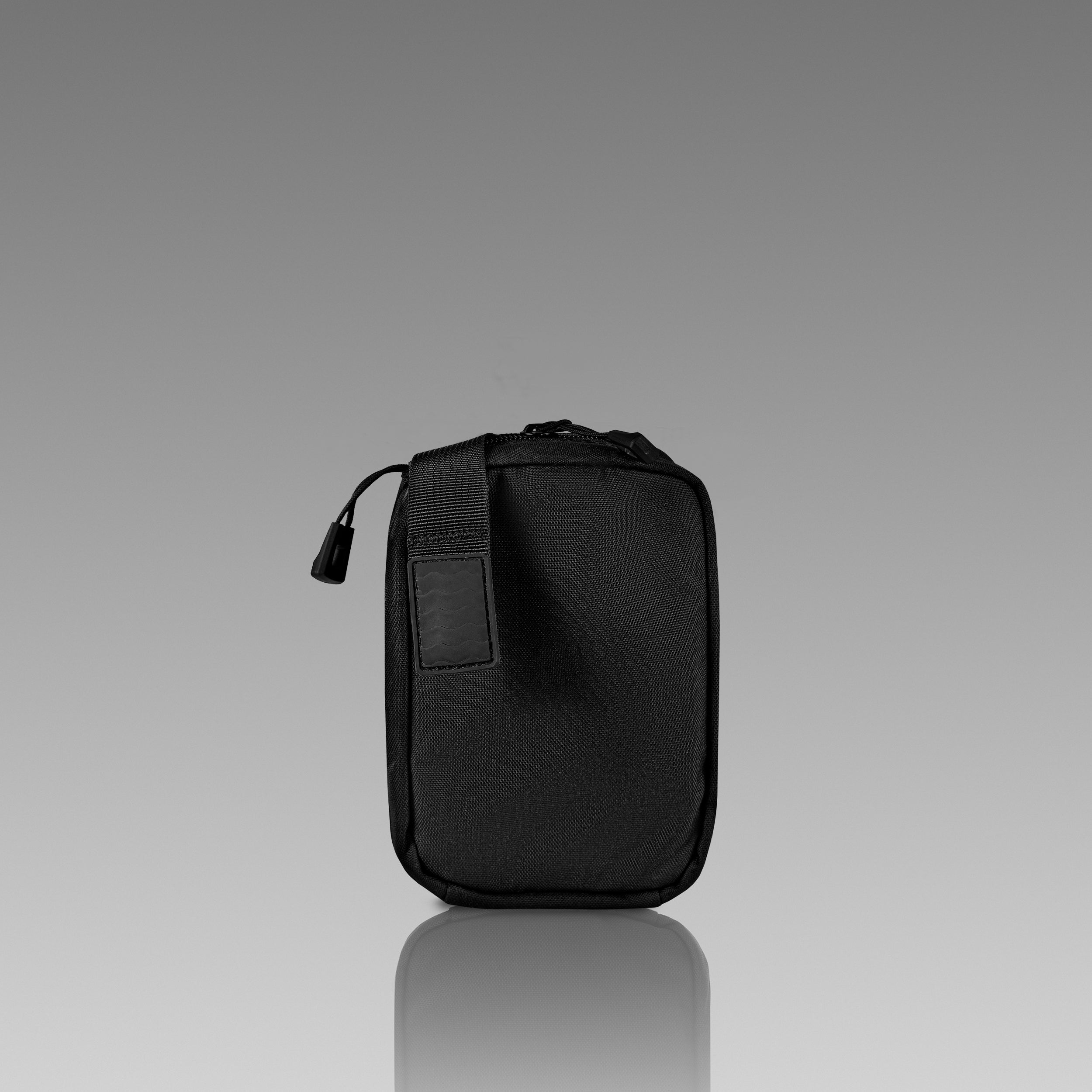 Black pouch on a gray background