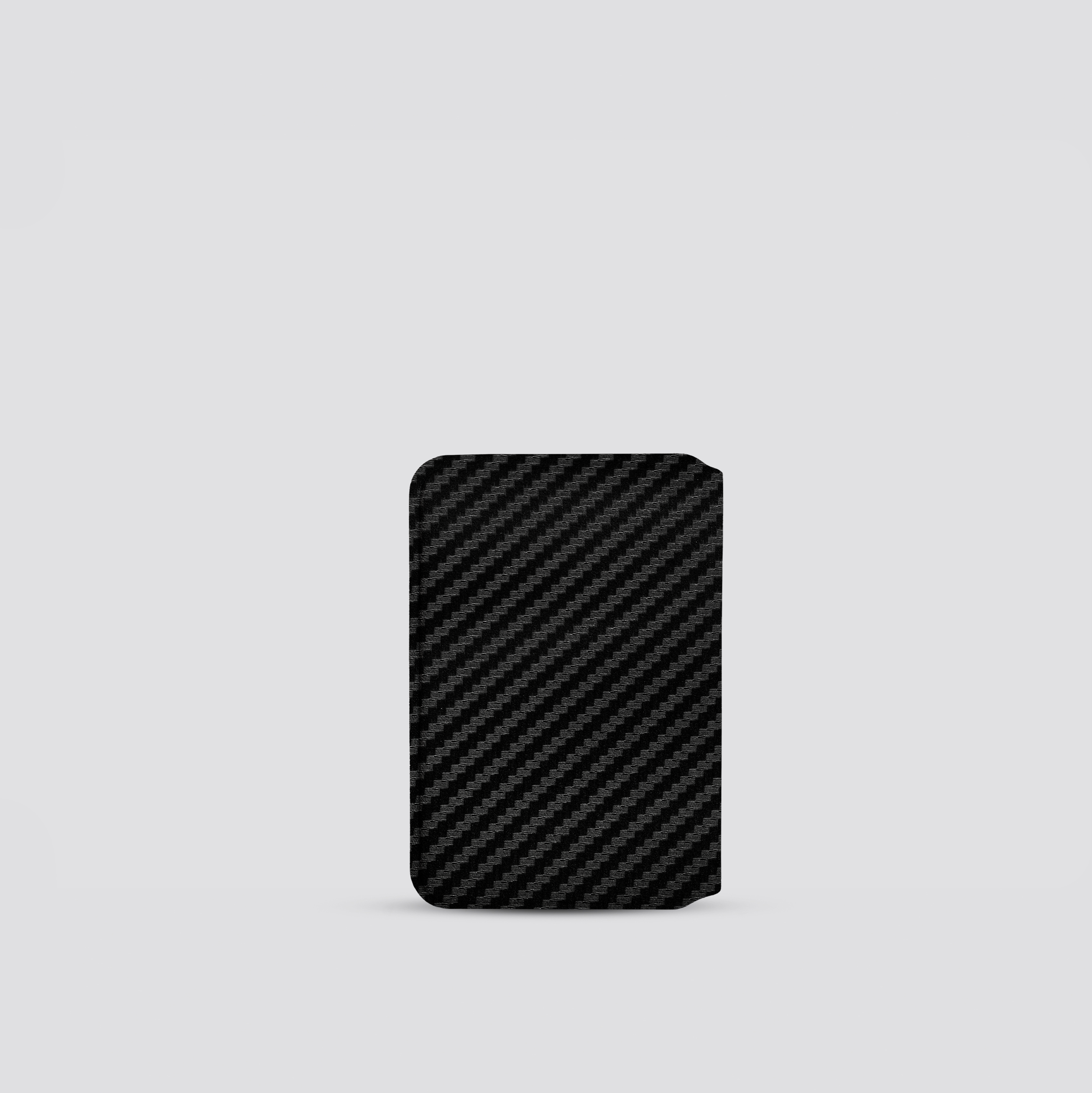 Black carbon fiber wallet on a light gray background