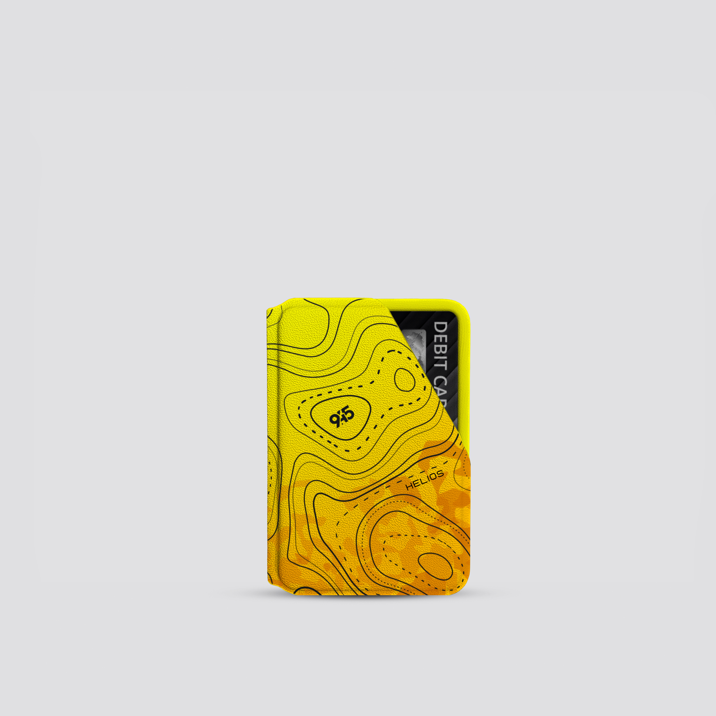 Yellow cardholder with topographic design on a light gray background