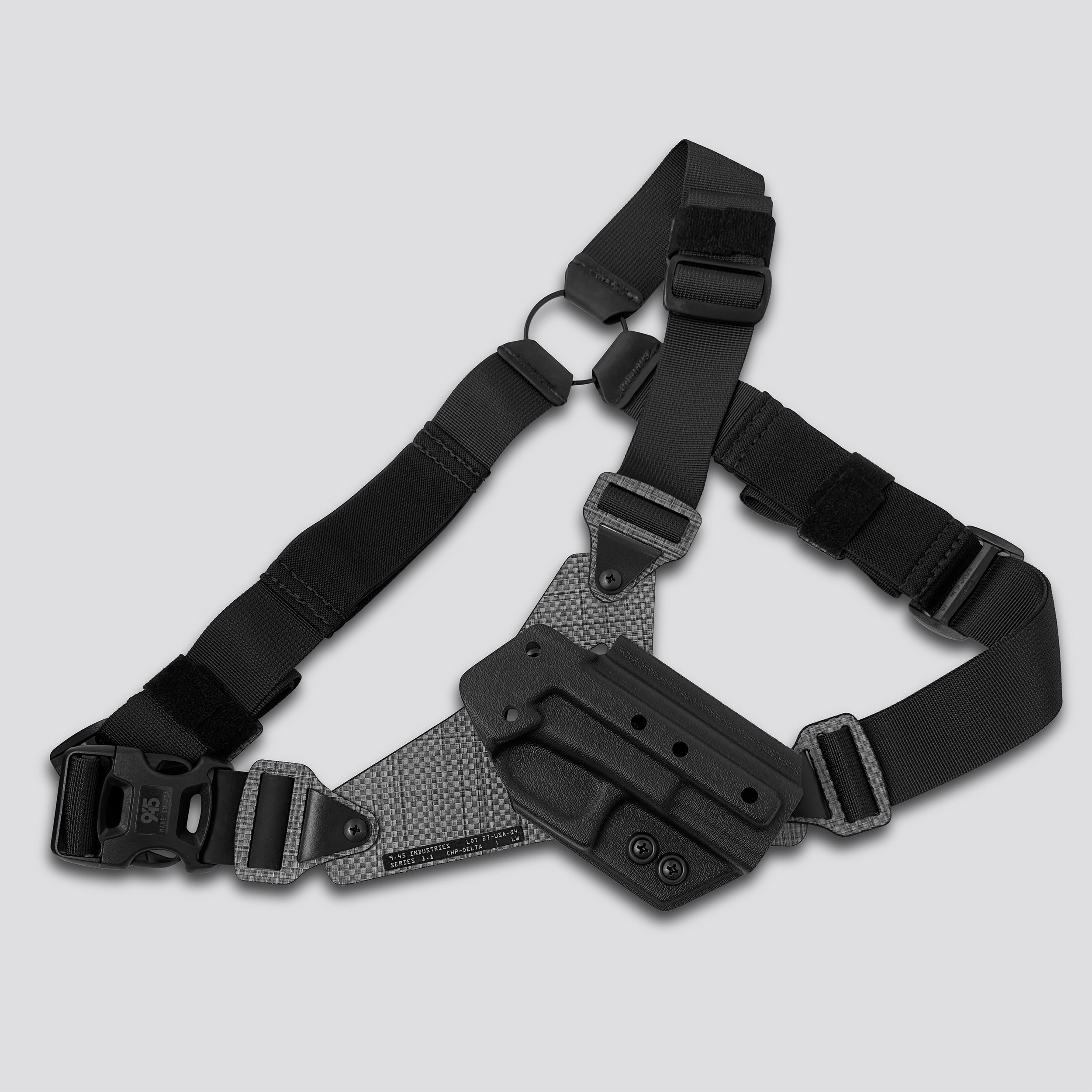 Black tactical holster with shoulder strap on a light gray background