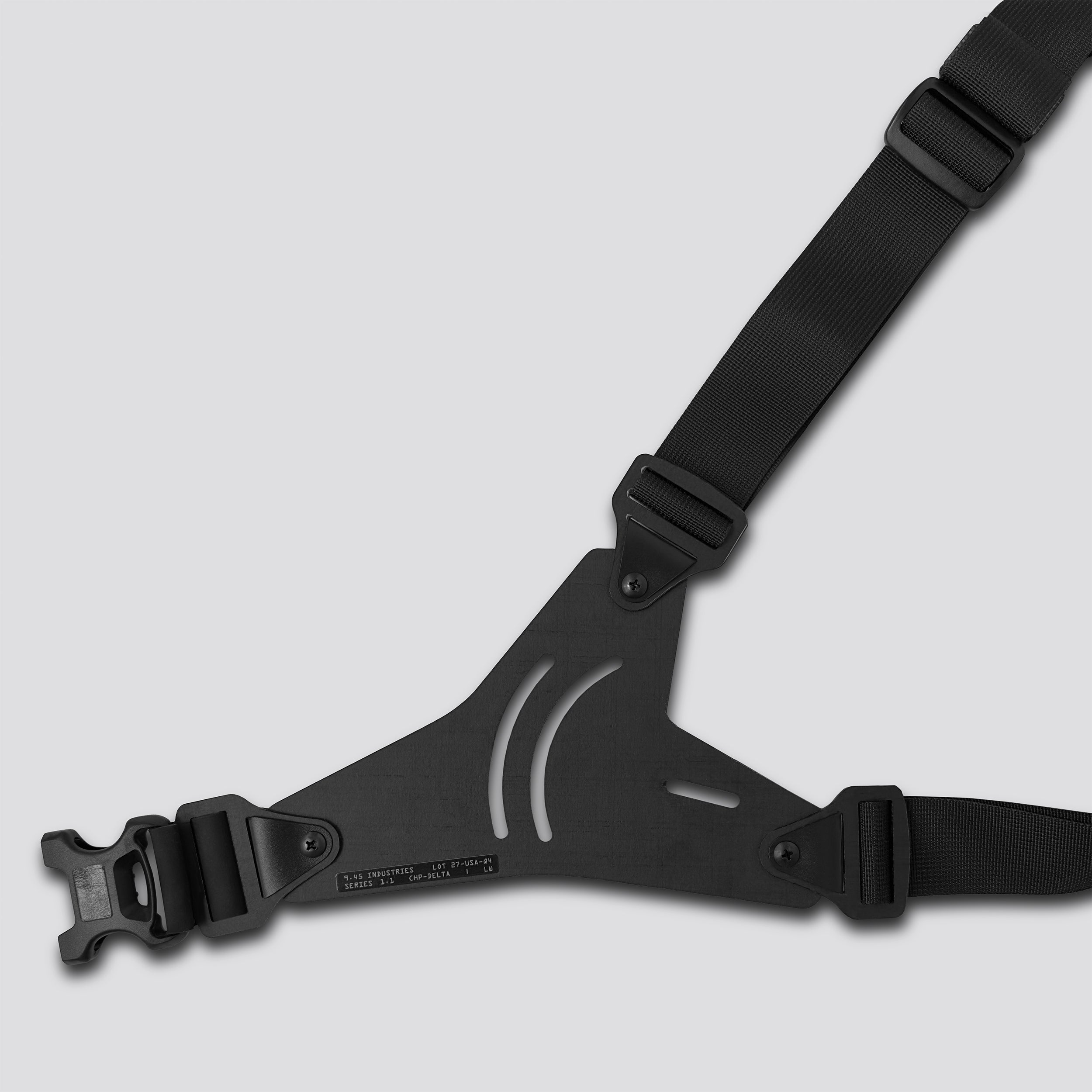 Black shoulder harness on a light gray background
