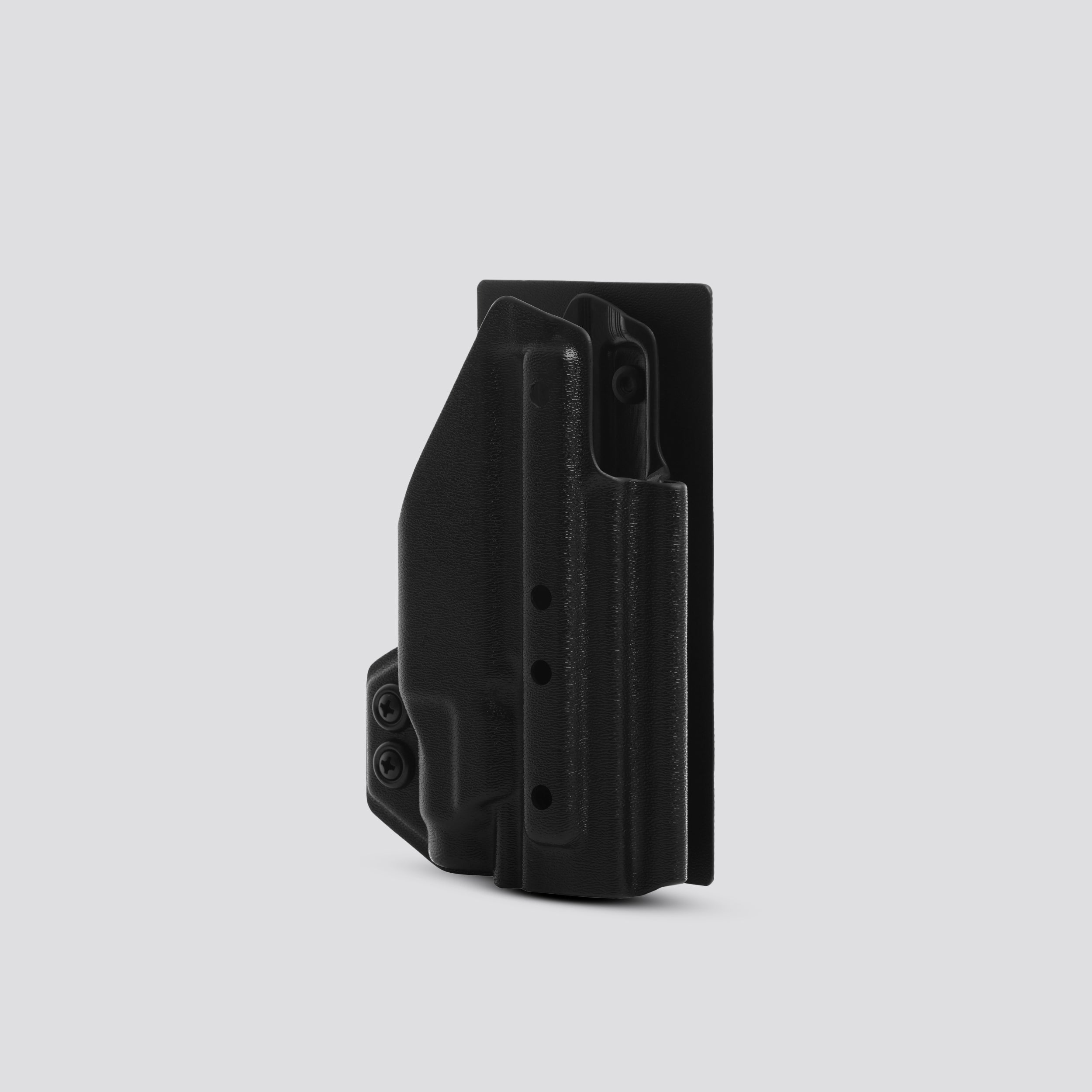 945 Industries Kydex holster with velcro hook attachment panel, light-bearing black