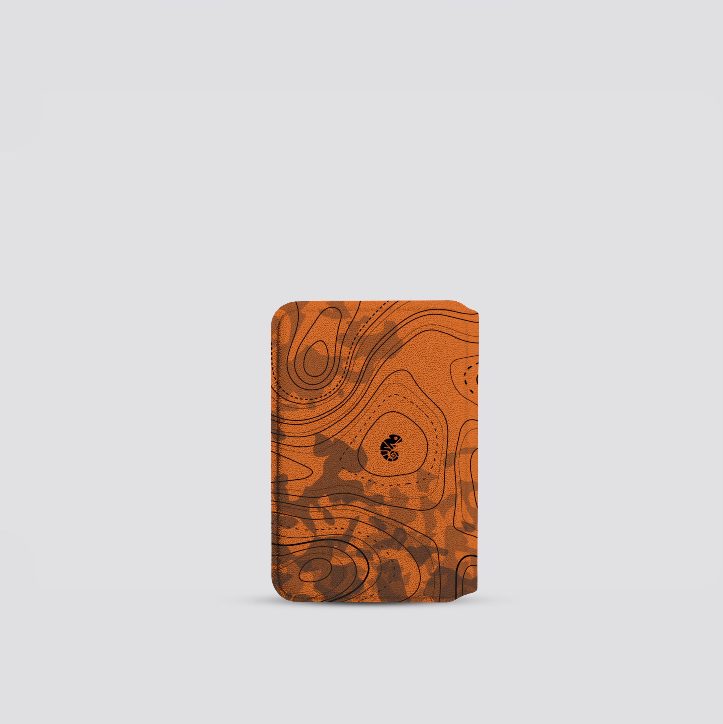 Brown notebook with abstract pattern on a light gray background